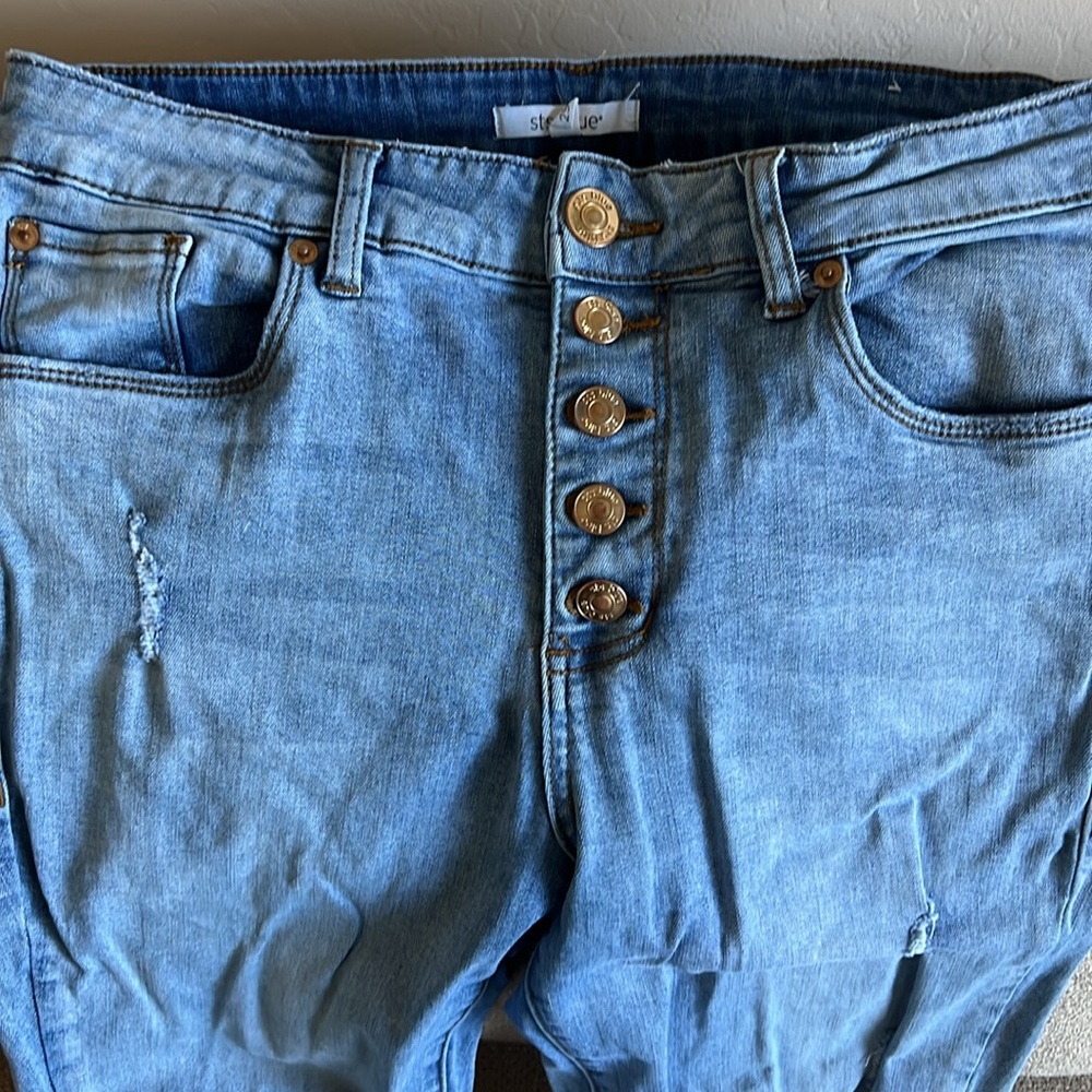Light wash distressed jeans
